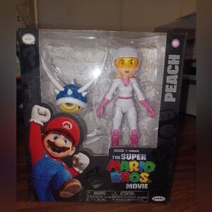 Jakks Pacific Super Mario Bros Movie 5 inch Racing Princess Peach Action Figure